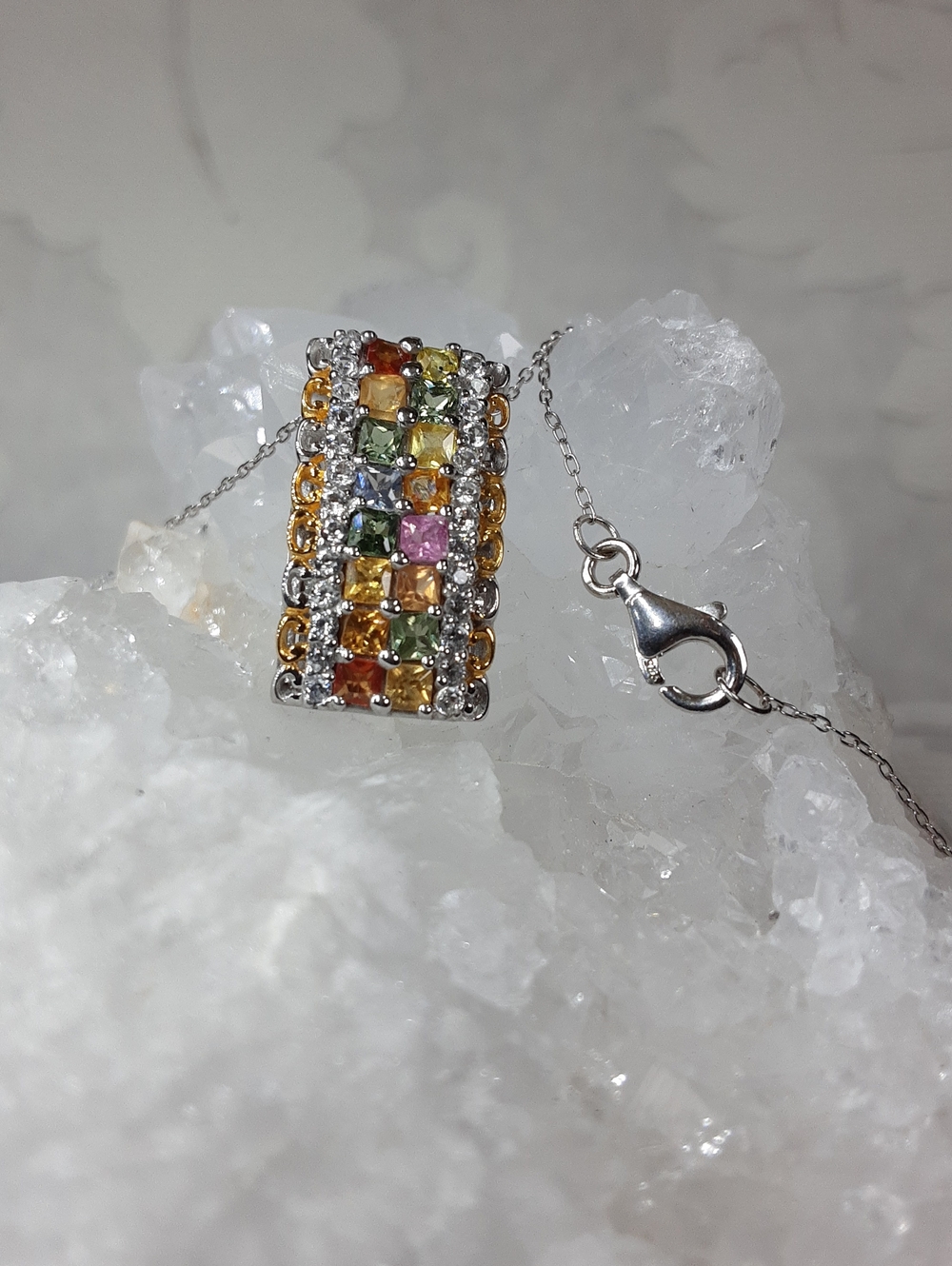 925 multi sapphire pendant with chain.